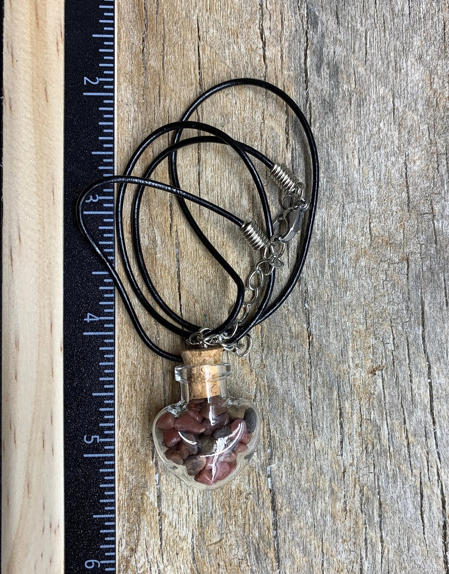 Tourmaline Necklace in Corked Heart Bottle. 18” cord with clasp. Shop Wholesale Crystals