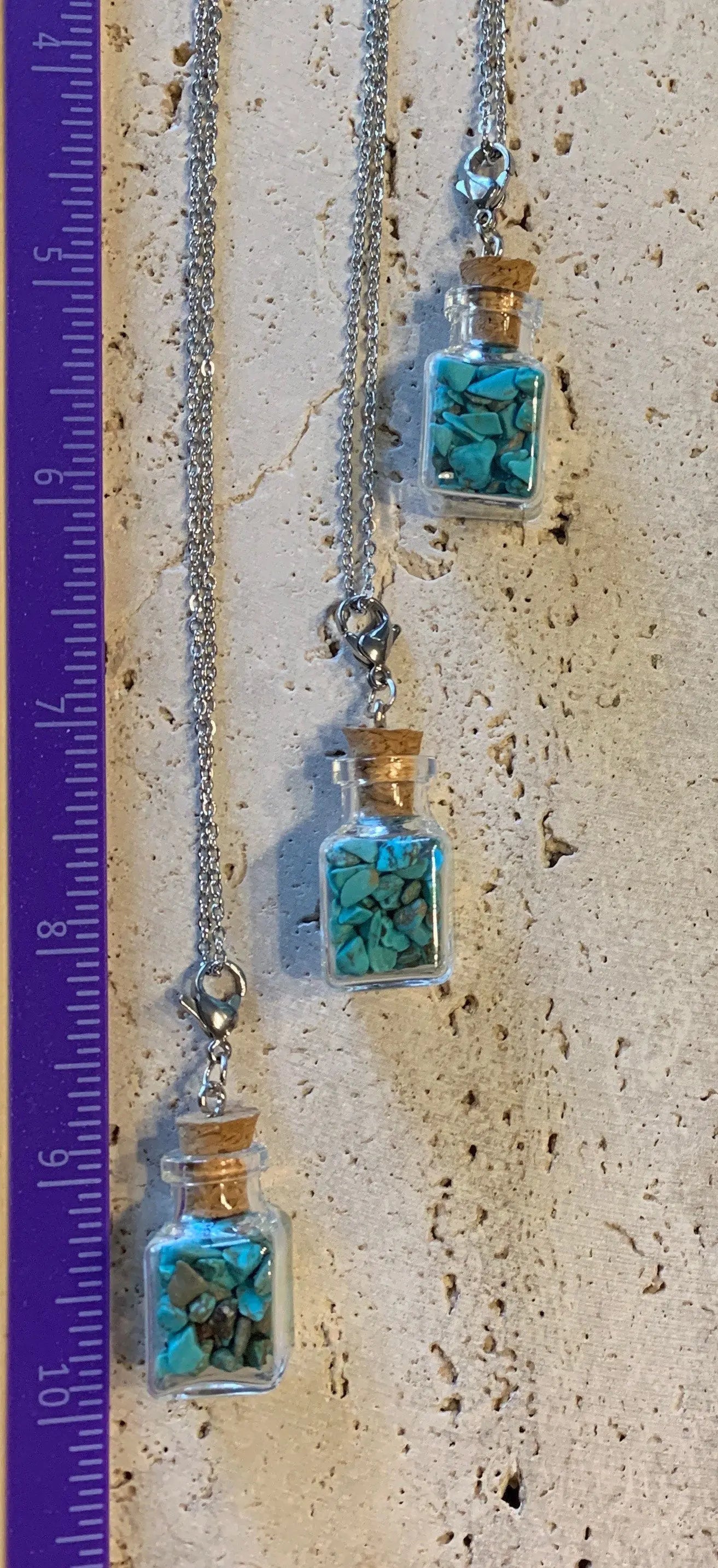 Blue Howlite Necklace 1075 In square corked bottle. 20” chain. Shop Wholesale Crystals
