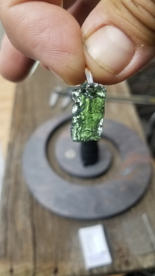 Naturally formed Moldavite from Czech Republic, (3.7gr) One Crystal, Rough, with .925 silver bell MOL-0009