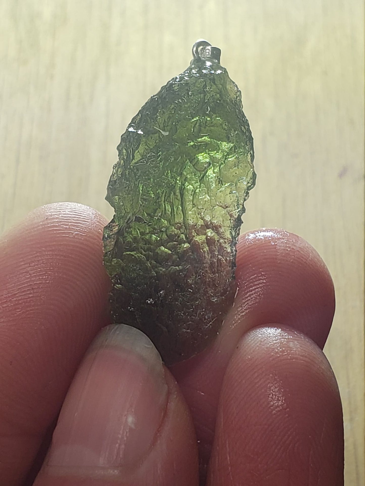 Naturally formed Moldavite from Czech Republic, (4.5 gr) One Crystal, Rough, with .925 silver bell MOL-0012