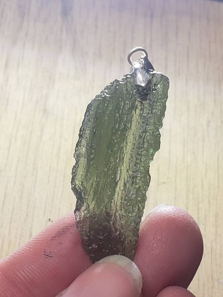 Naturally formed Moldavite Feather Pendant from Czech Republic, (5.2 gr) One Crystal, Rough, with .925 silver bell MOL-0017