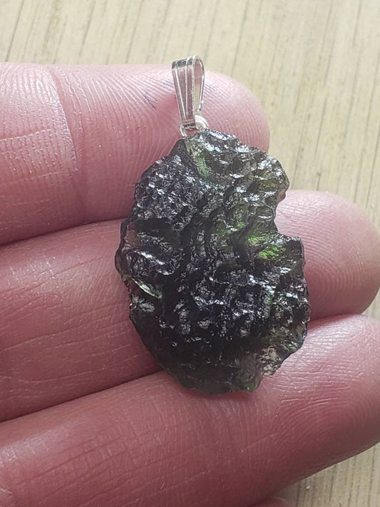 Naturally formed Moldavite from Czech Republic, (4.9 gr) One Crystal, Rough, with .925 silver bell MOL-0016