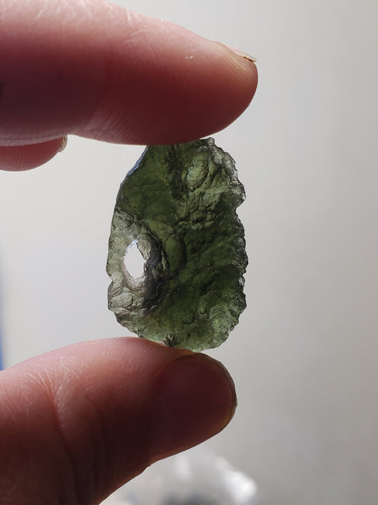 Naturally formed Moldavite from Czech Republic, (5 gr) One Crystal, Rough, with .925 silver bell MOL-0014