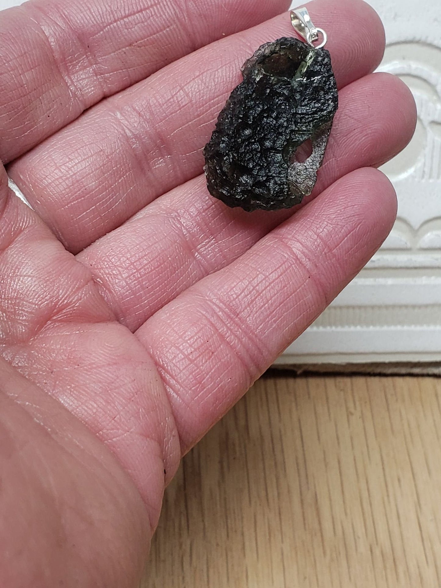 Naturally formed Moldavite from Czech Republic, (5 gr) One Crystal, Rough, with .925 silver bell MOL-0014