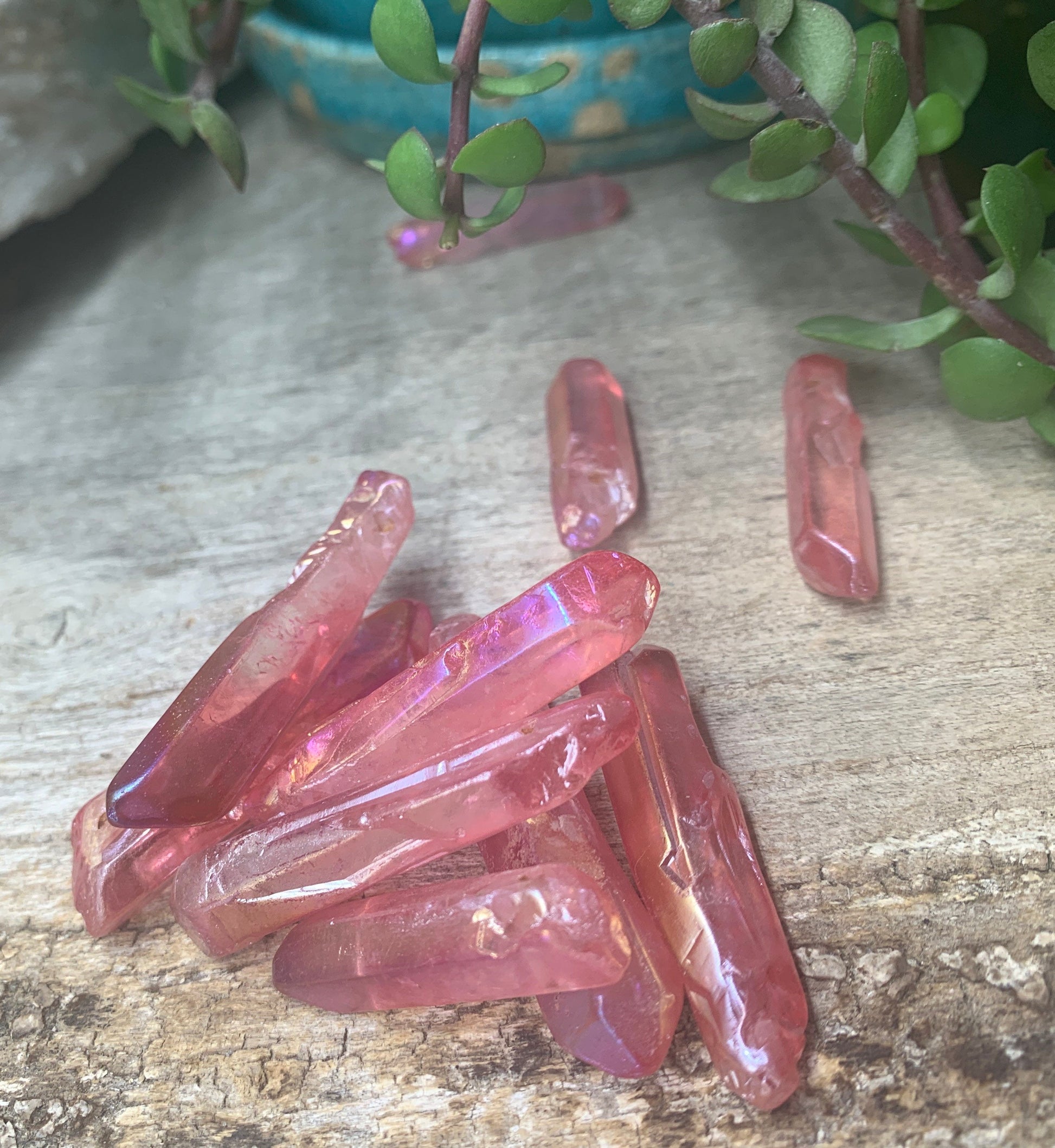 "Sparkling pink aura quartz crystal point beads - radiating gentle elegance and positive energy.