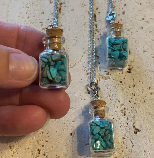 Blue Howlite Necklace 1075 In square corked bottle. 20” chain.