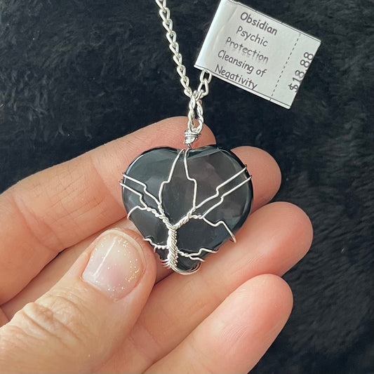 Tree of life, silver wire wrapped, obsidian heart pendant with a silver chain.  obsidian heart crystal os approximately 1" X 1 1/4".