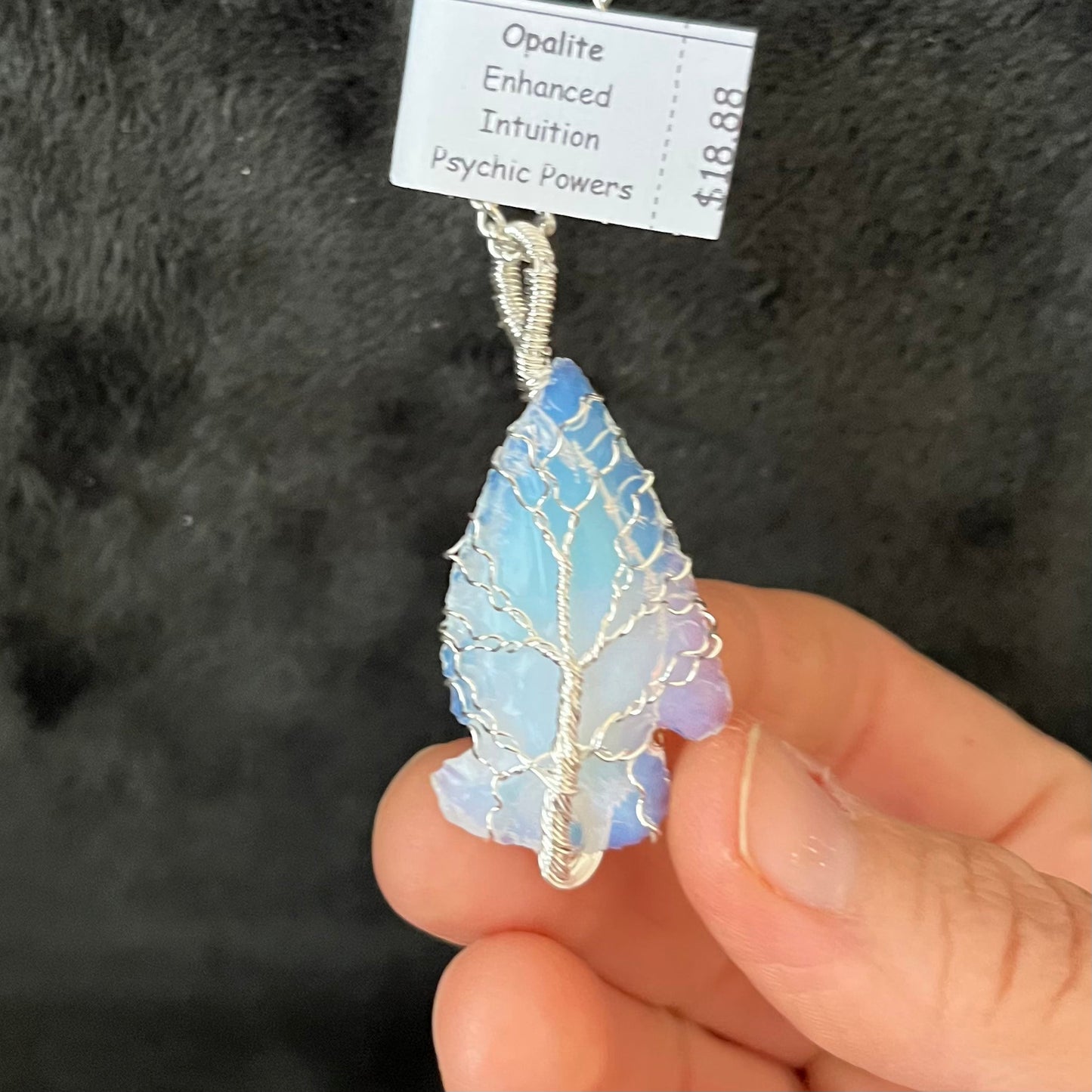 beautiful tree of life, silver wire wrapped opalite arrowhead pendant with a silver chain.  opalite arrowhead crystal is approximately 1 1/2" long