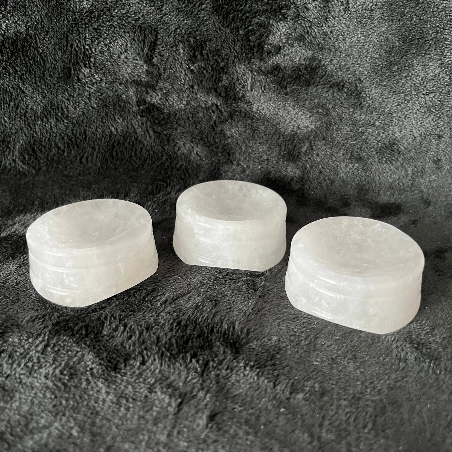 3 Shiny marbled quartz sphere stands approximately 1” high and 2” in diameter, displayed against a black background.